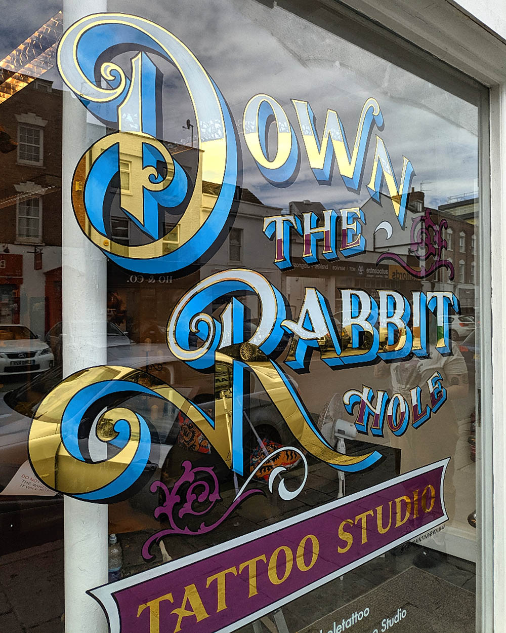 down-the-rabbit-hole_tattoo_shop_window_gloucester_gold-leaf_handpainted
